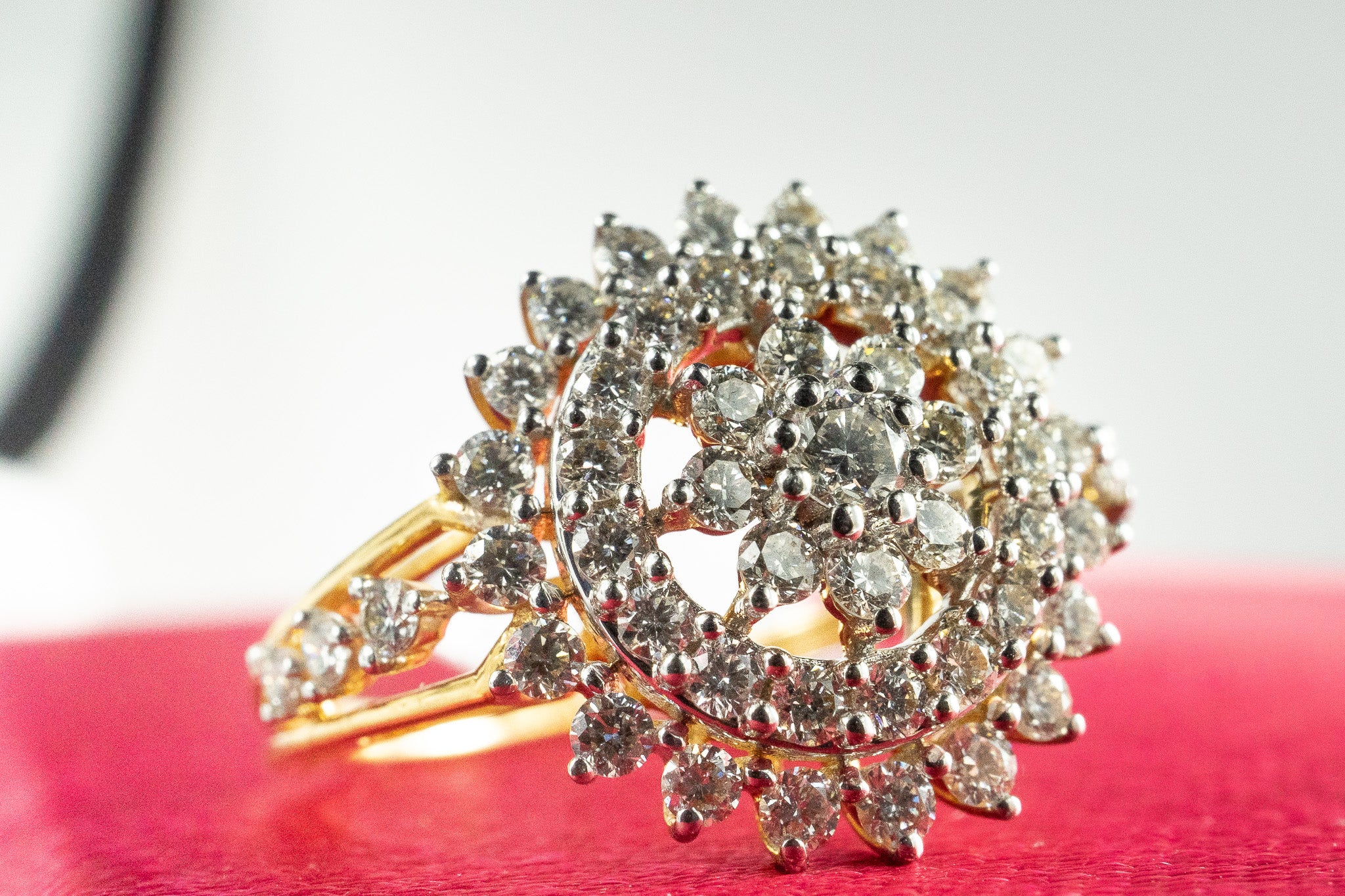 18k gold diamond cluster ring with 0.65 carat total diamond weight, close-up view