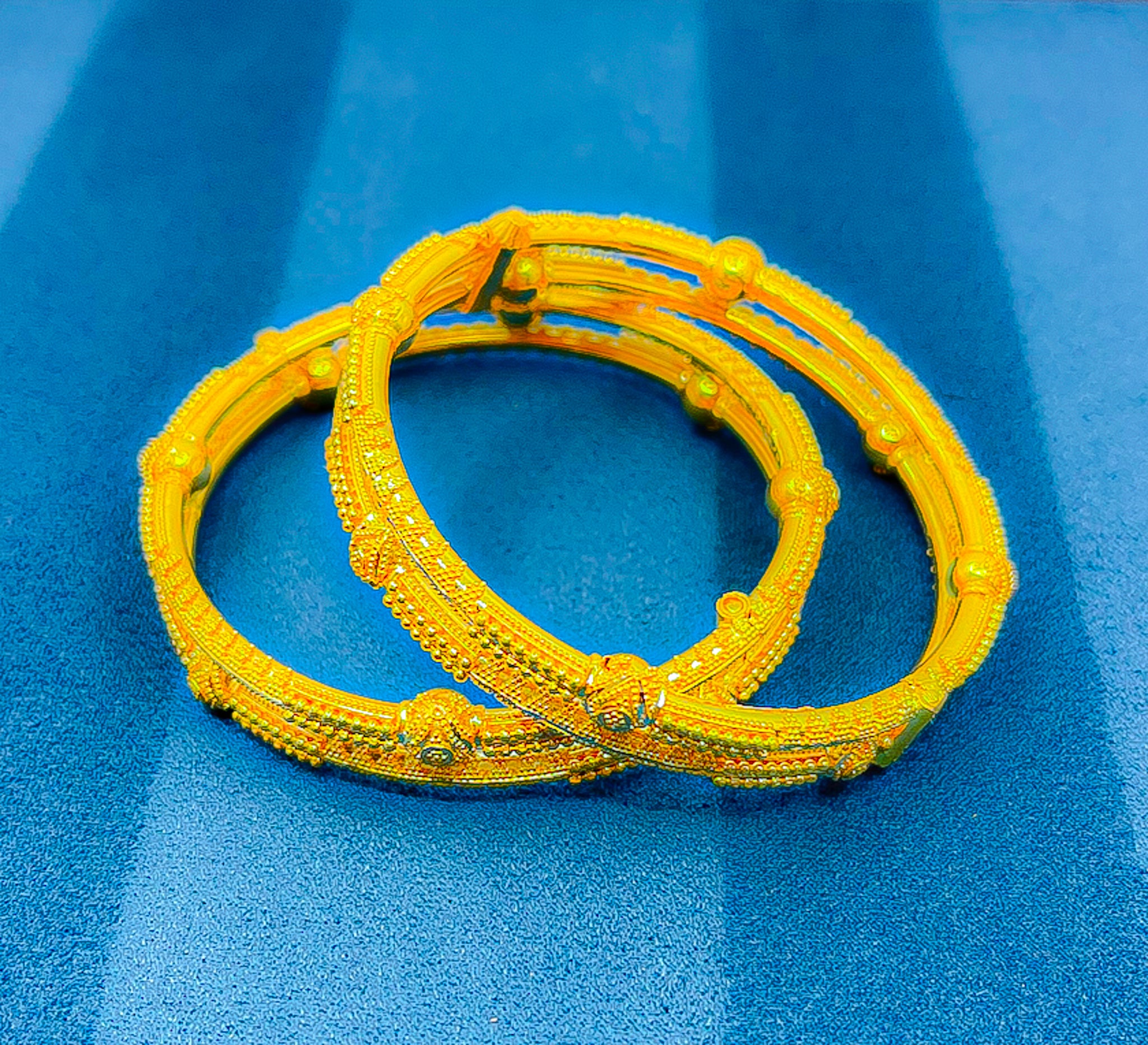 view of 22K gold bangle set (2 PCS) showing intricate textured pattern