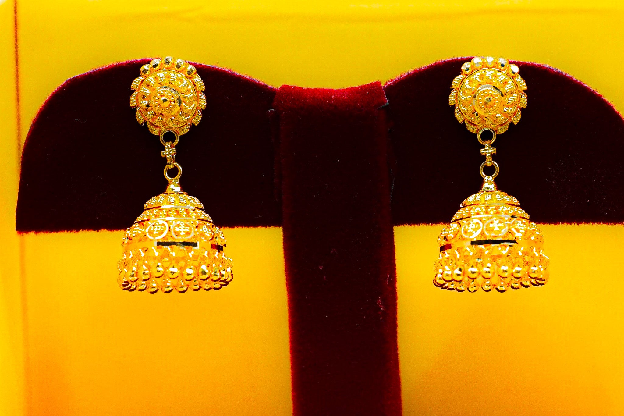 Pair of 22K gold jhumka drop earrings, traditional dome design