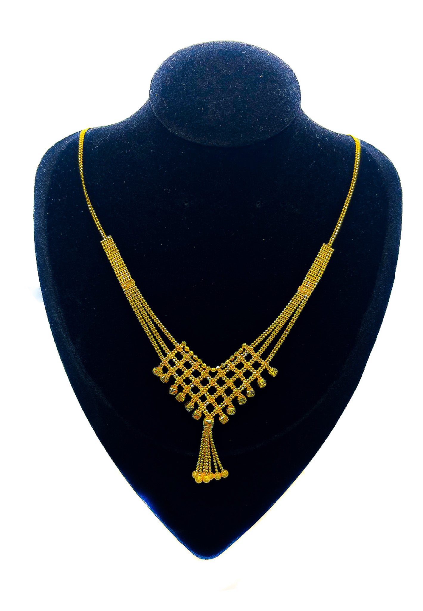 22K yellow gold statement necklace 14.68g with geometric pendant and tassel drop on black velvet display