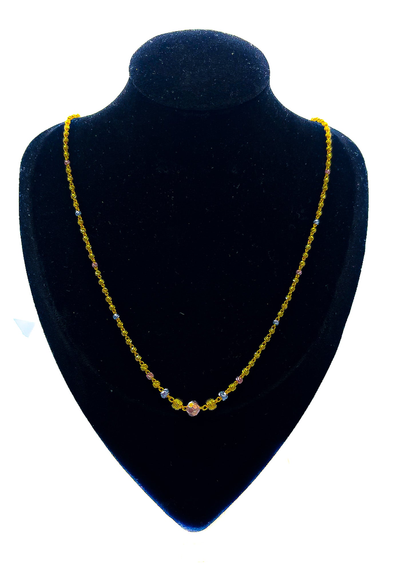 22k yellow gold minimal chain necklace displayed on black velvet mannequin bust