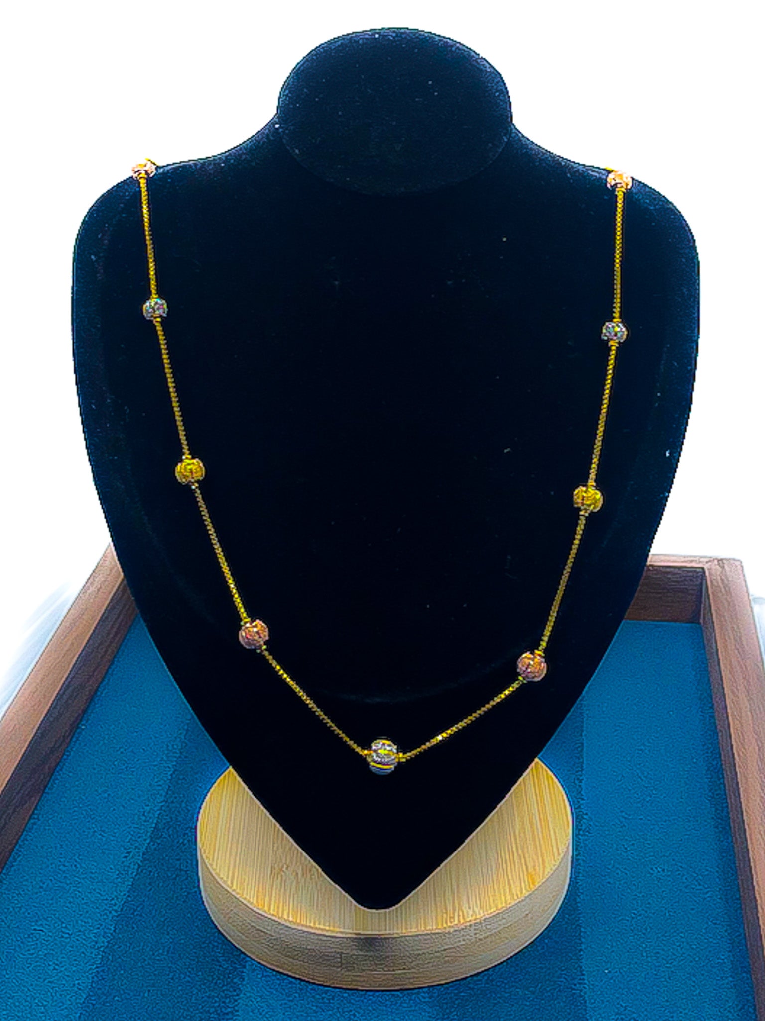 22k gold station necklace 15.05g on black velvet display