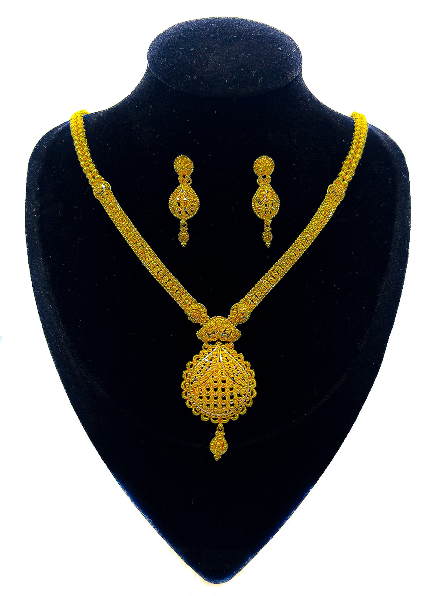 22K yellow gold necklace and drop earrings set on black velvet mannequin, front view