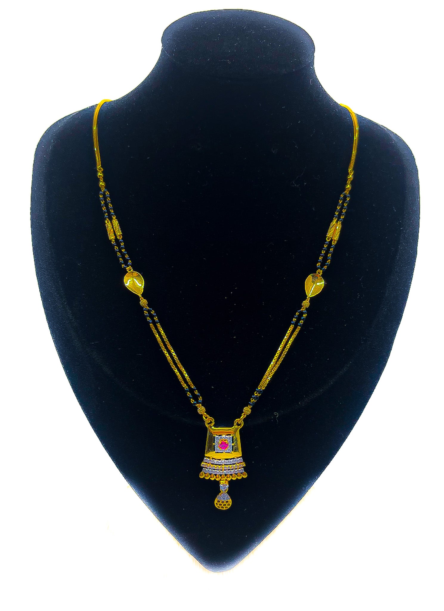22k gold mangalsutra necklace with black beads and gold pendant, front view on black bust