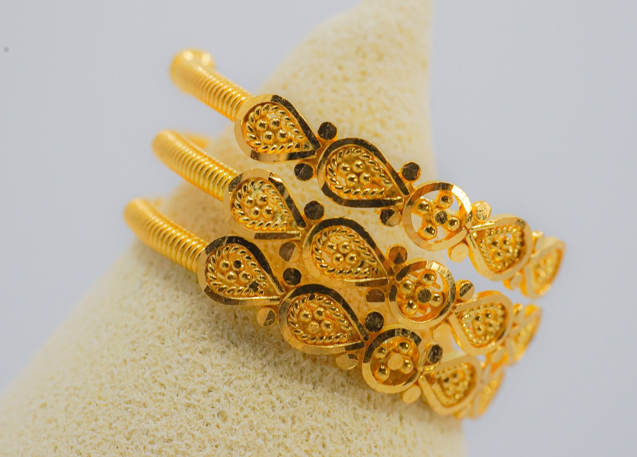 22k yellow gold wide statement ring with teardrop motif design, size 6.5