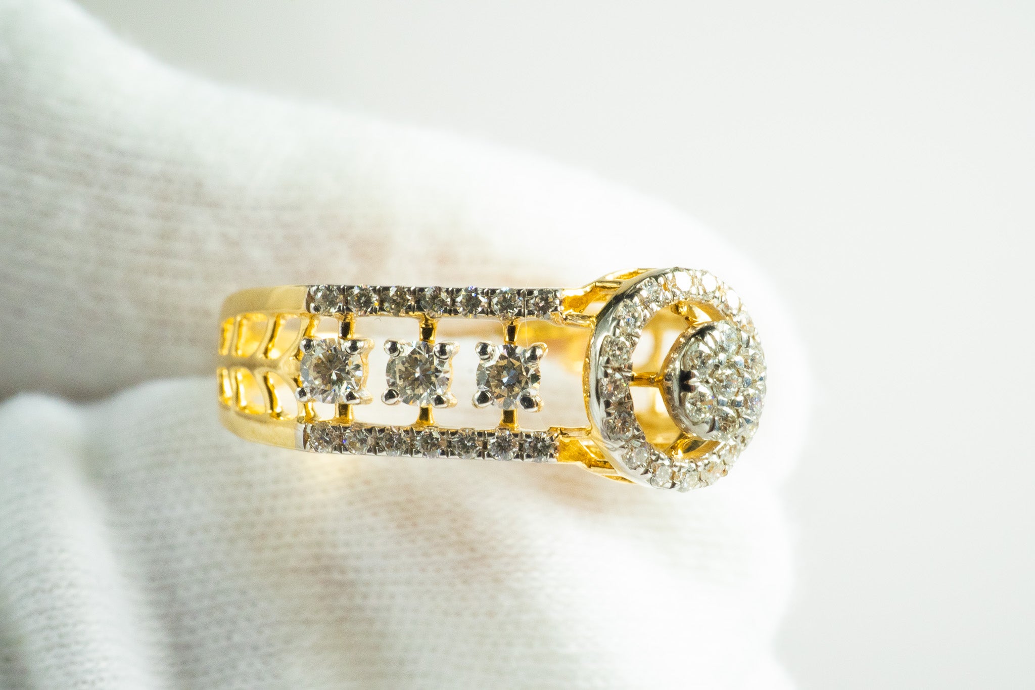 Front view of Twilight Crown men’s halo diamond ring in 18K yellow gold with pavé band and 0.56 ct diamonds