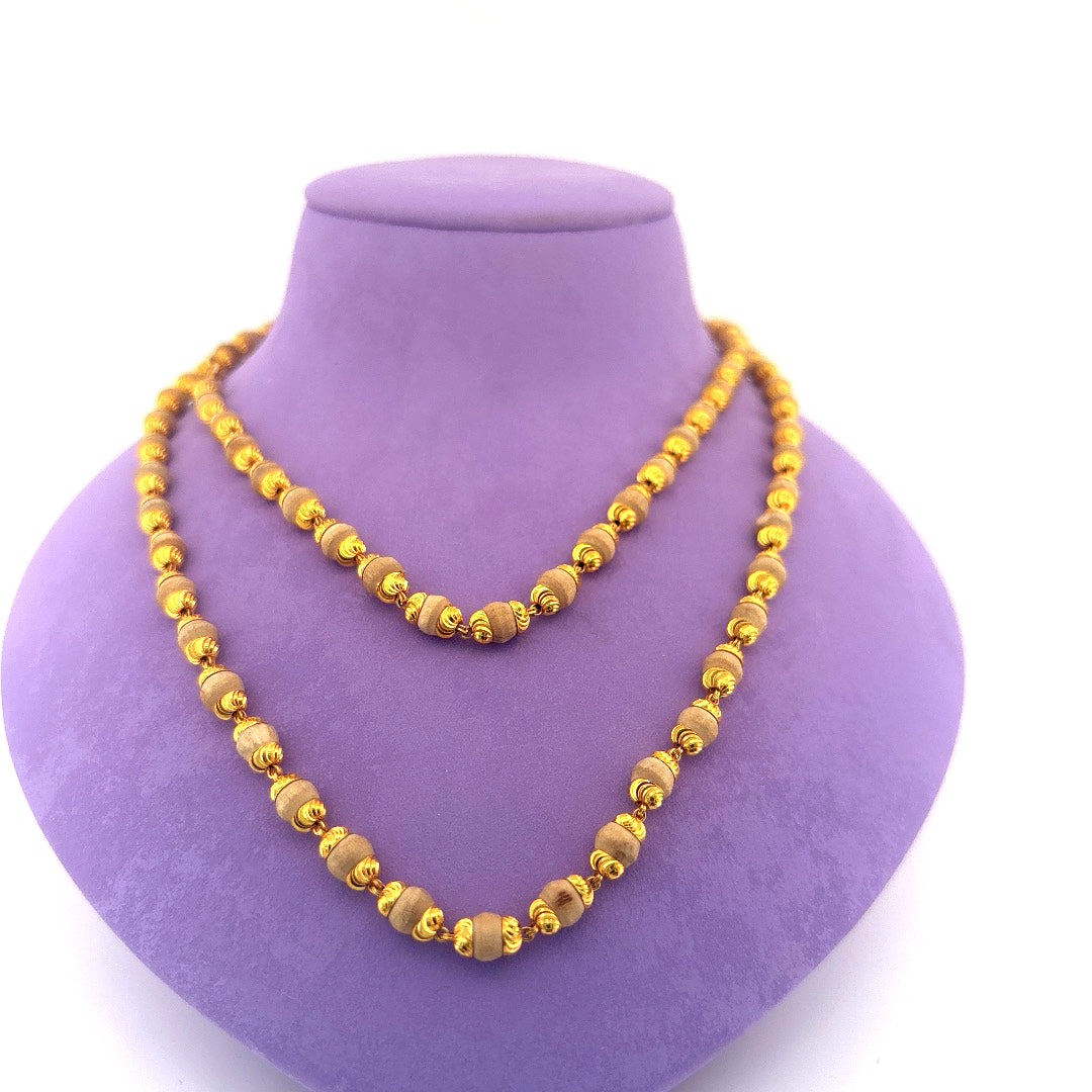 Gold chain with beads wt 23.6