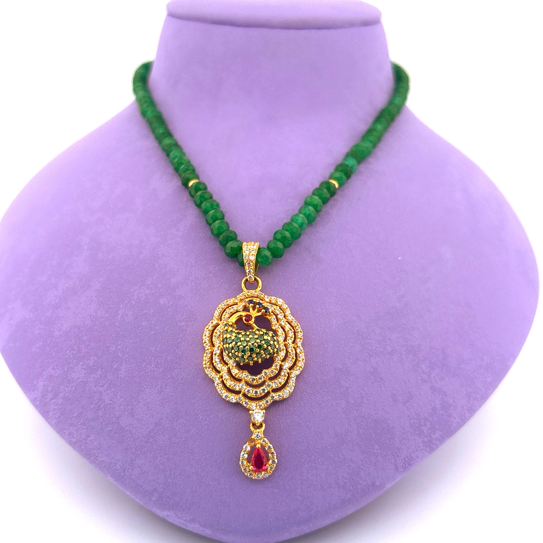 Jade necklace with gold pendant