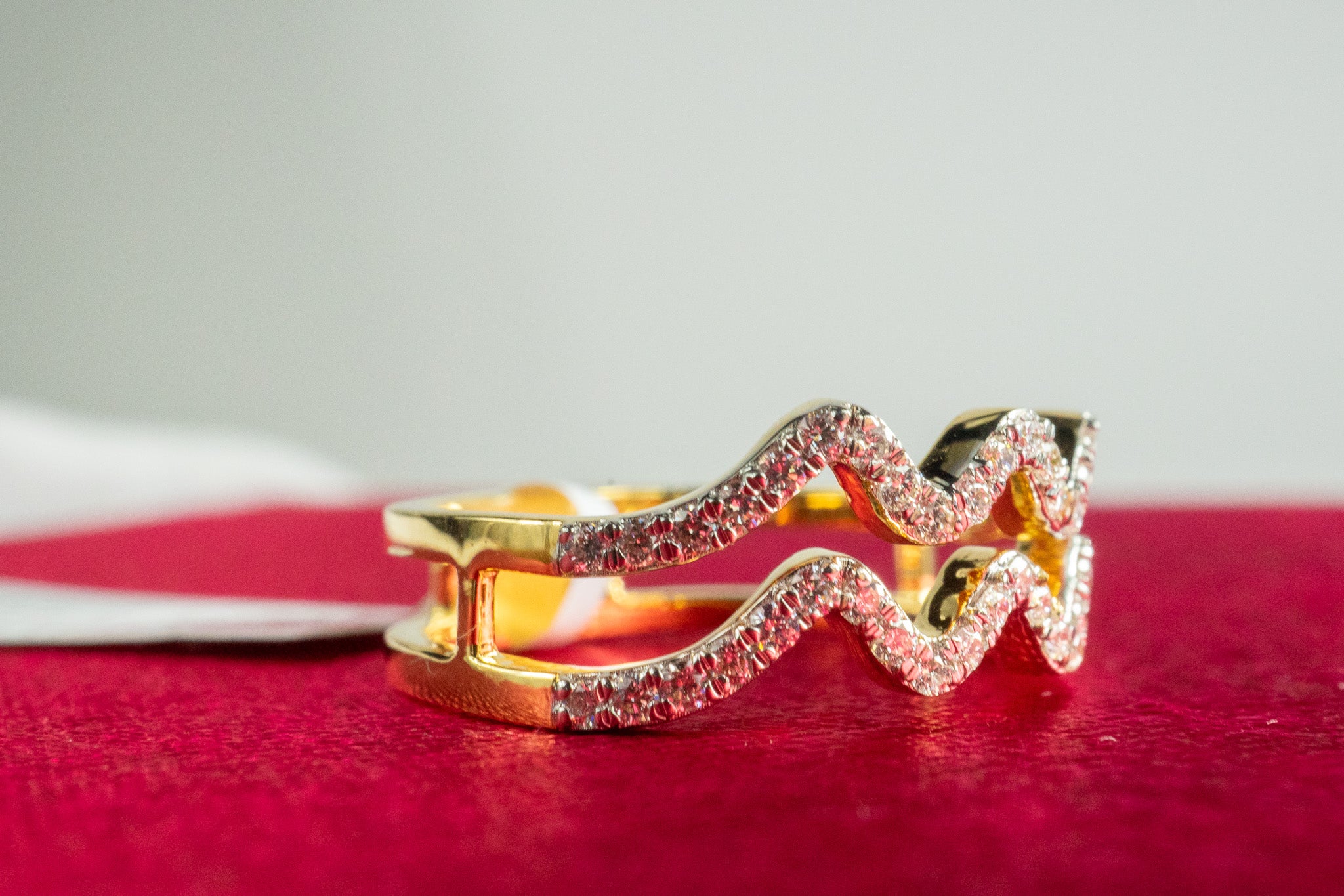 Side view of 18k gold Velvet Dust Ring with split-band construction and pavé diamond detailing, 0.25 carat total diamond weight.