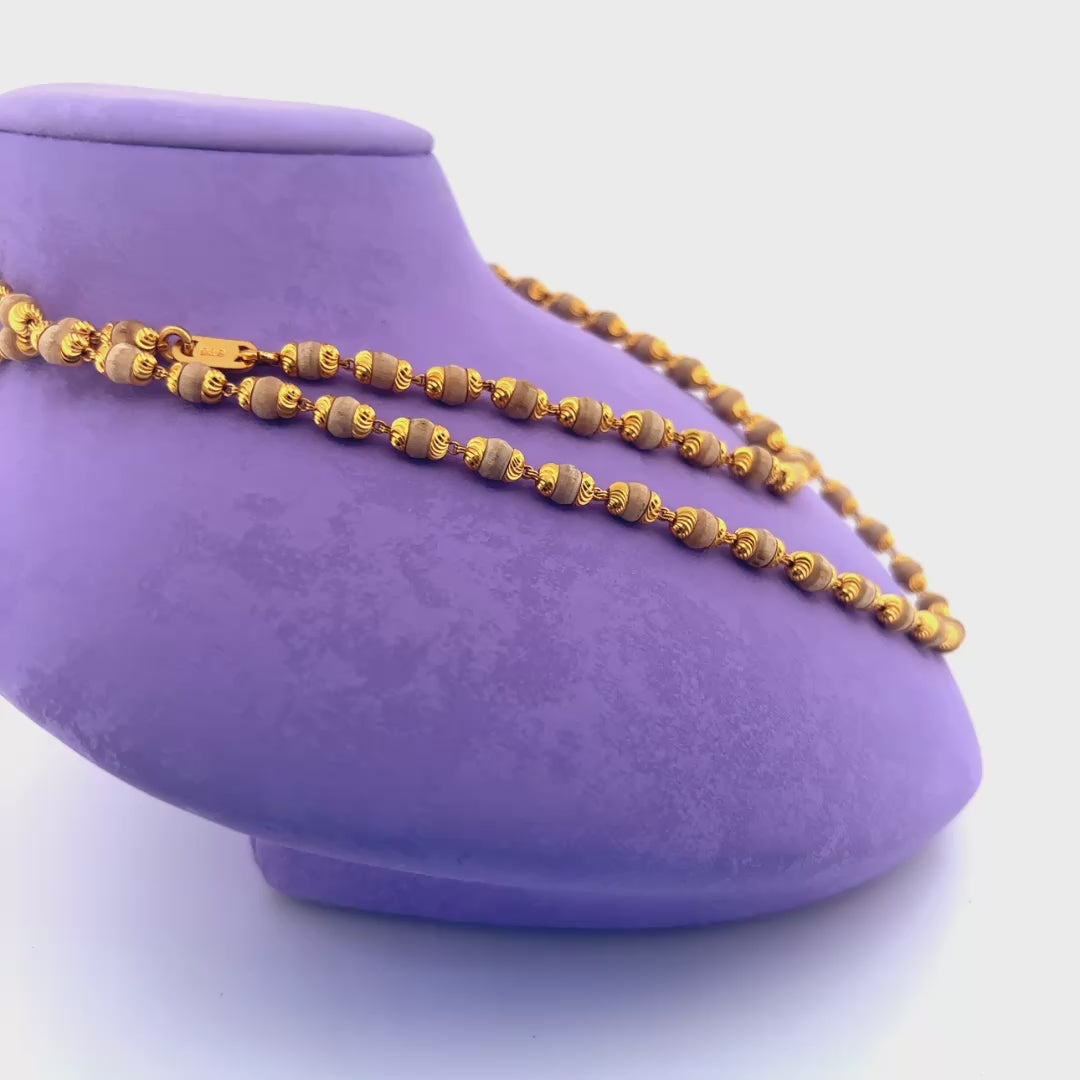 Gold chain with beads wt 23.6